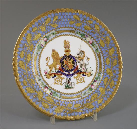 A rare Rockingham porcelain sample plate for the William IV service, c.1830-7, D. 23.6cm, repaired